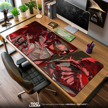 Large gaming mouse pad with anime design on a desk with computer setup