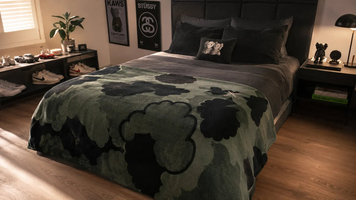 Green and black camo area rug in a streetwear bedroom with sneaker shelf