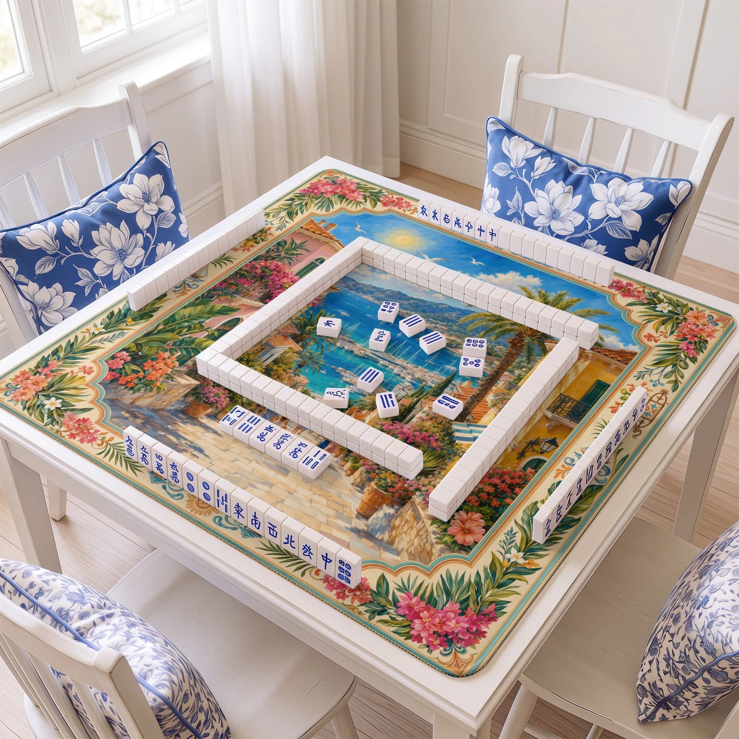 Amalfi Coast mahjong mat with tiles and racks on the table