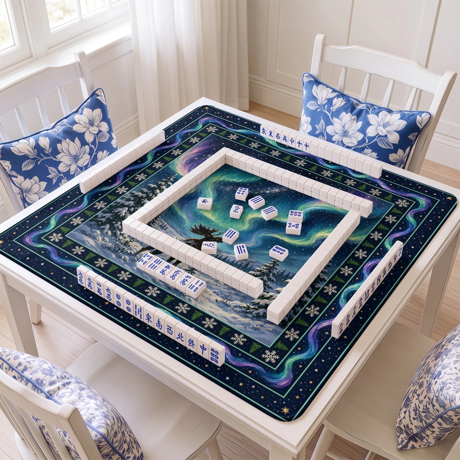 Aurora Moose mahjong mat with tiles and racks on the table