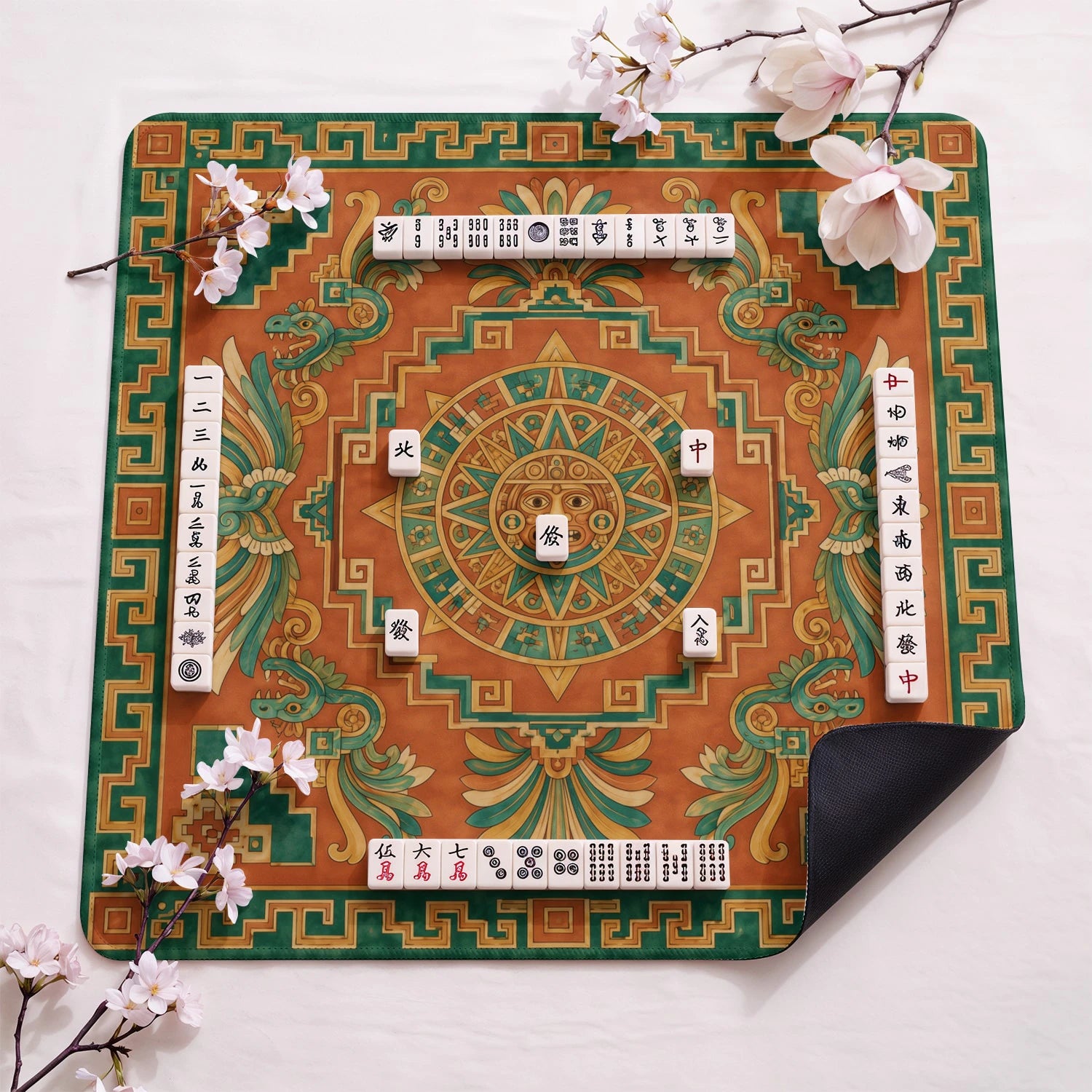 Aztec Sun design close-up on mahjong mat surface