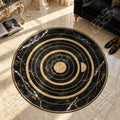 Black Marble Orbit abstract round rug in a styled room - abstract circle area rug
