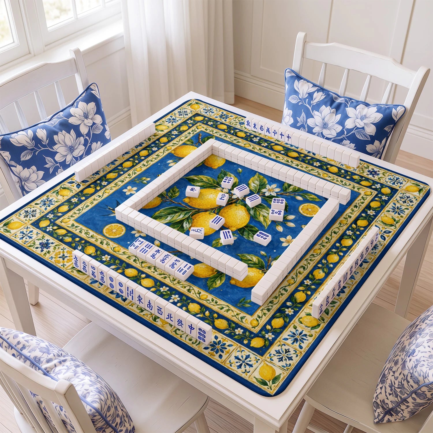 Blue Amalfi Lemon mahjong mat with tiles and racks on the table