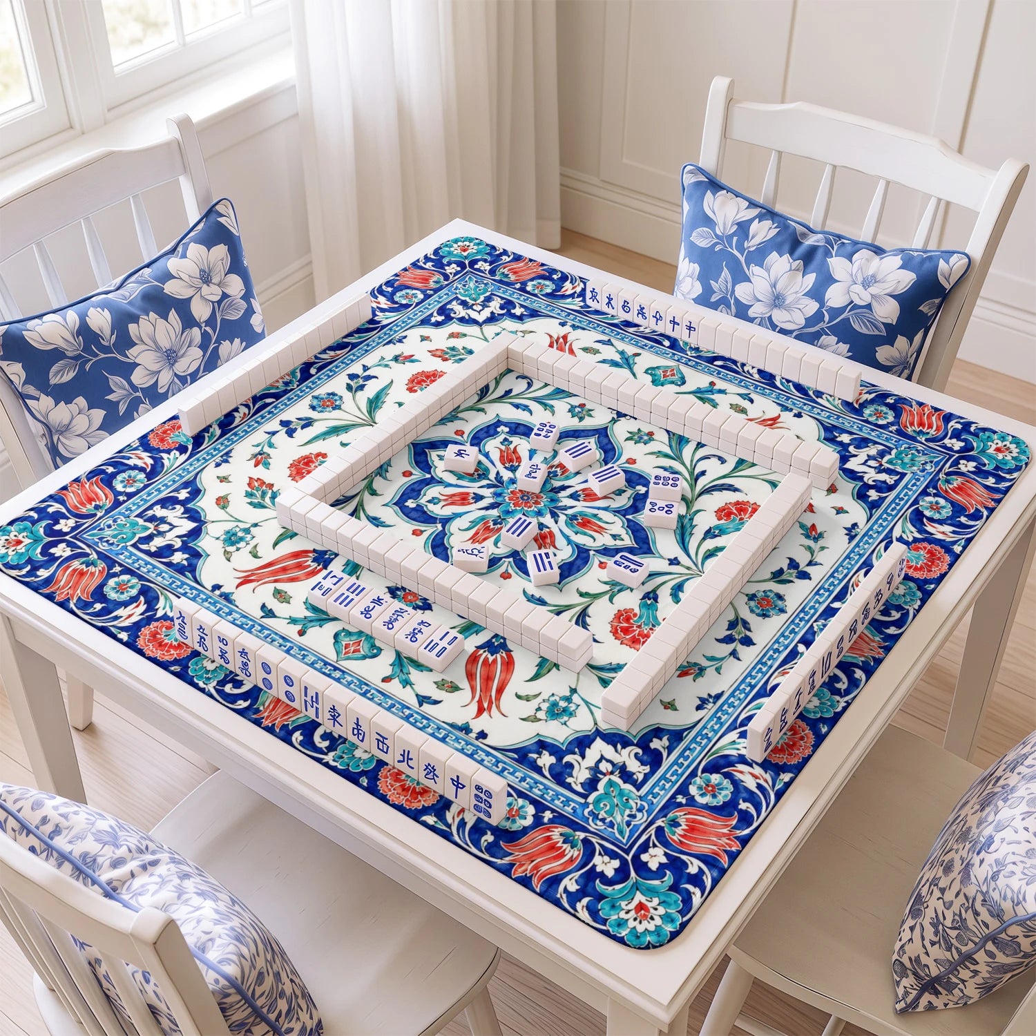 Blue Iznik Tile mahjong mat with tiles and racks on the table