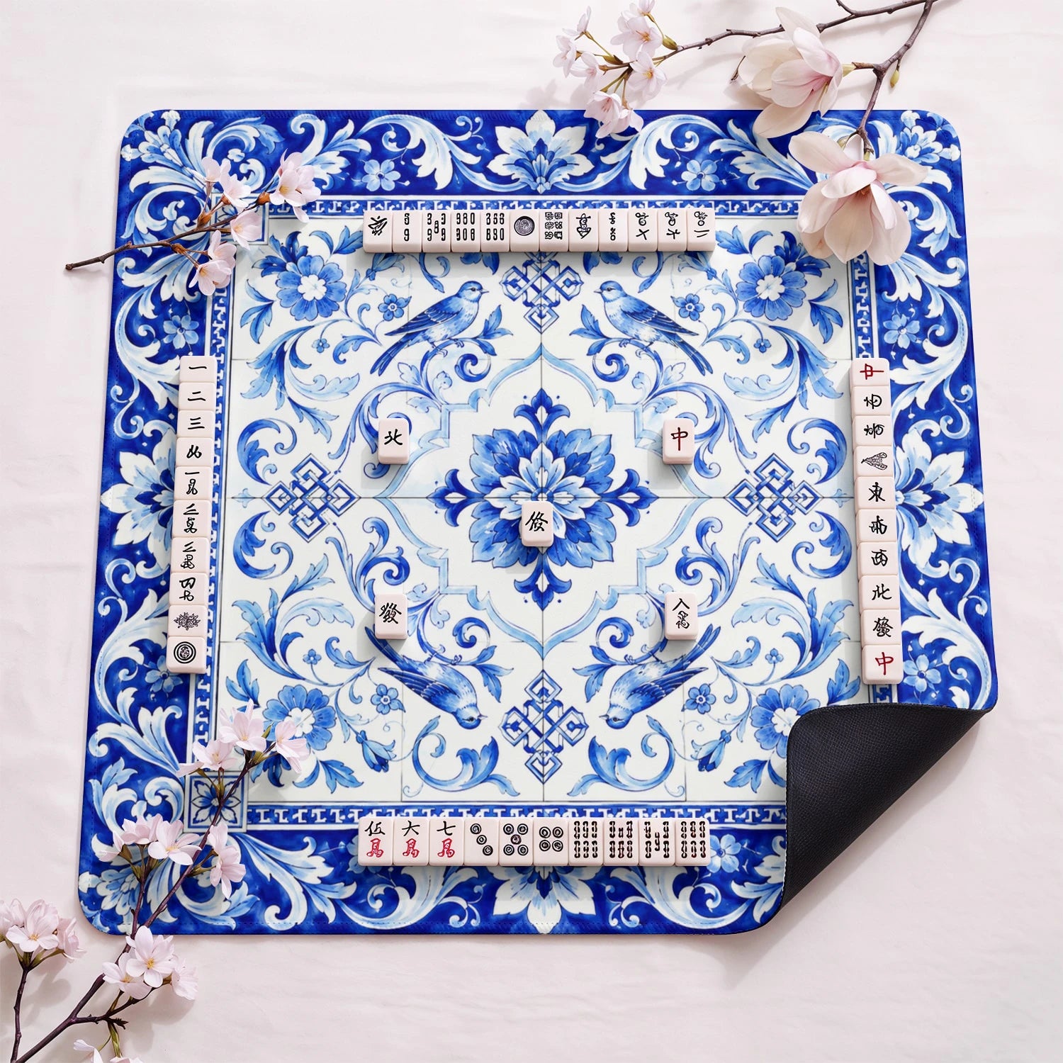 Blue White Tile Bird design close-up on mahjong mat surface