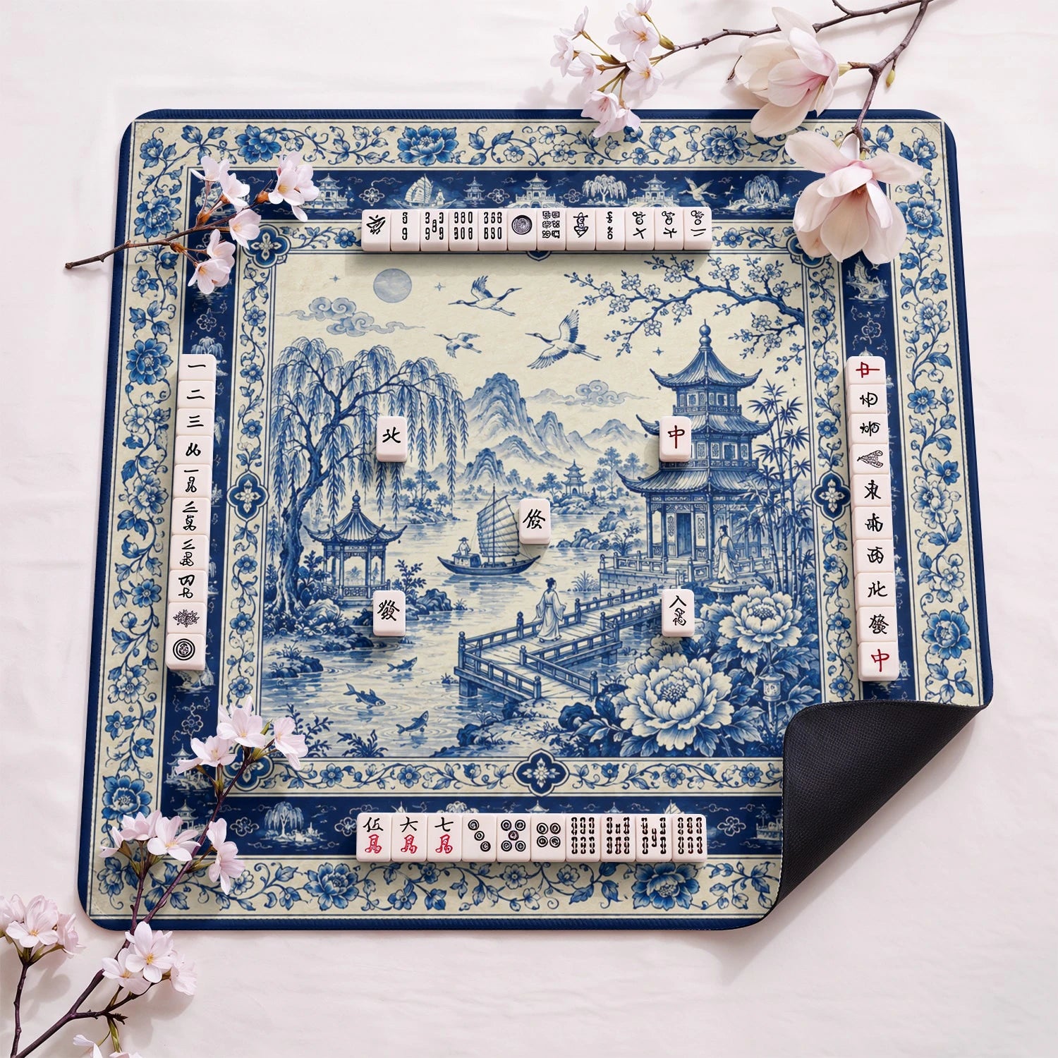 Blue Willow design close-up on mahjong mat surface