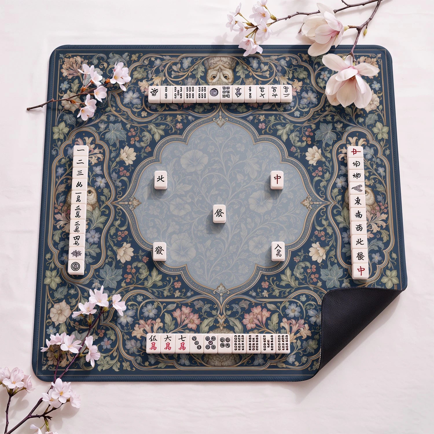 Blush Ragdoll design close-up on mahjong mat surface