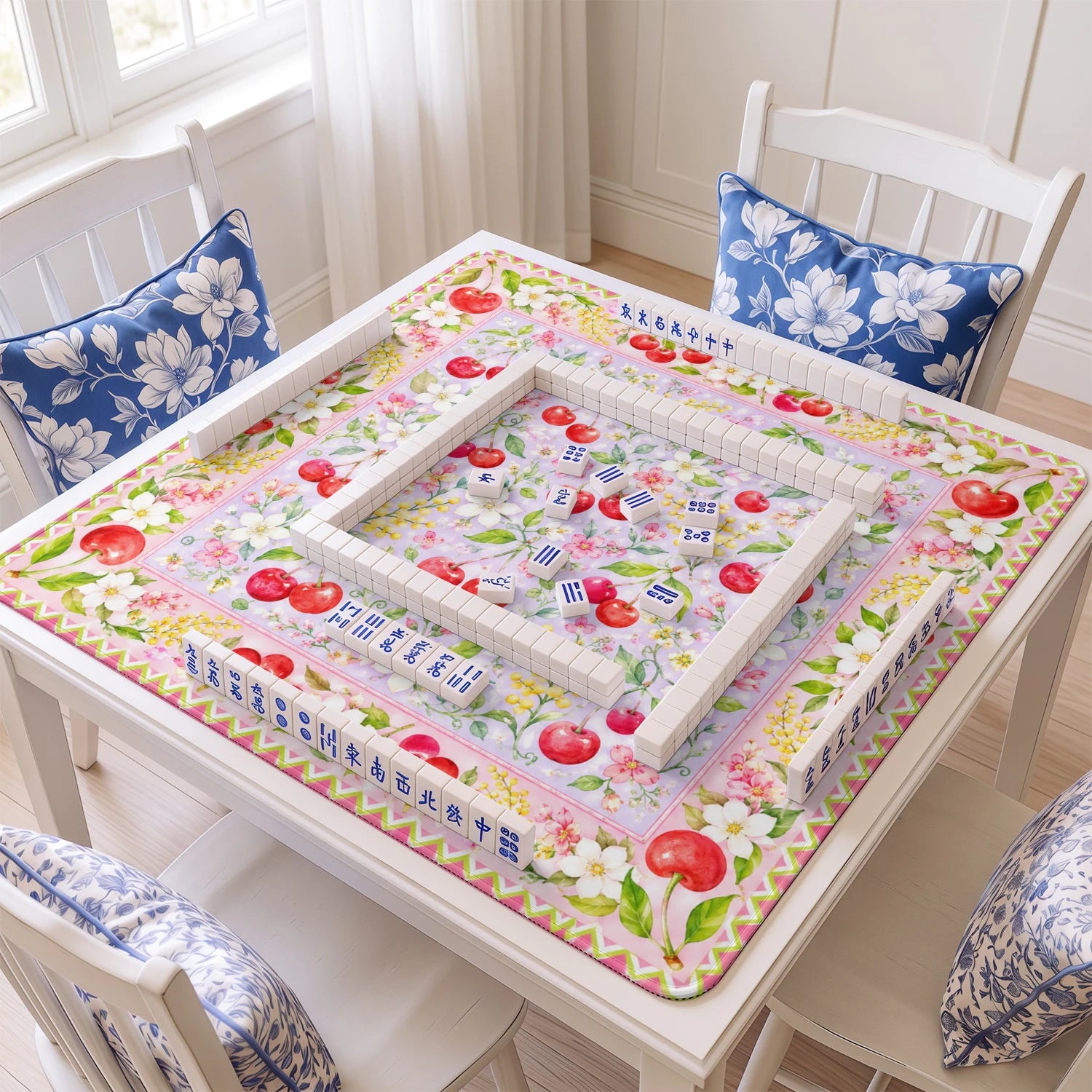 Cherry Blossom mahjong mat with tiles and racks on the table