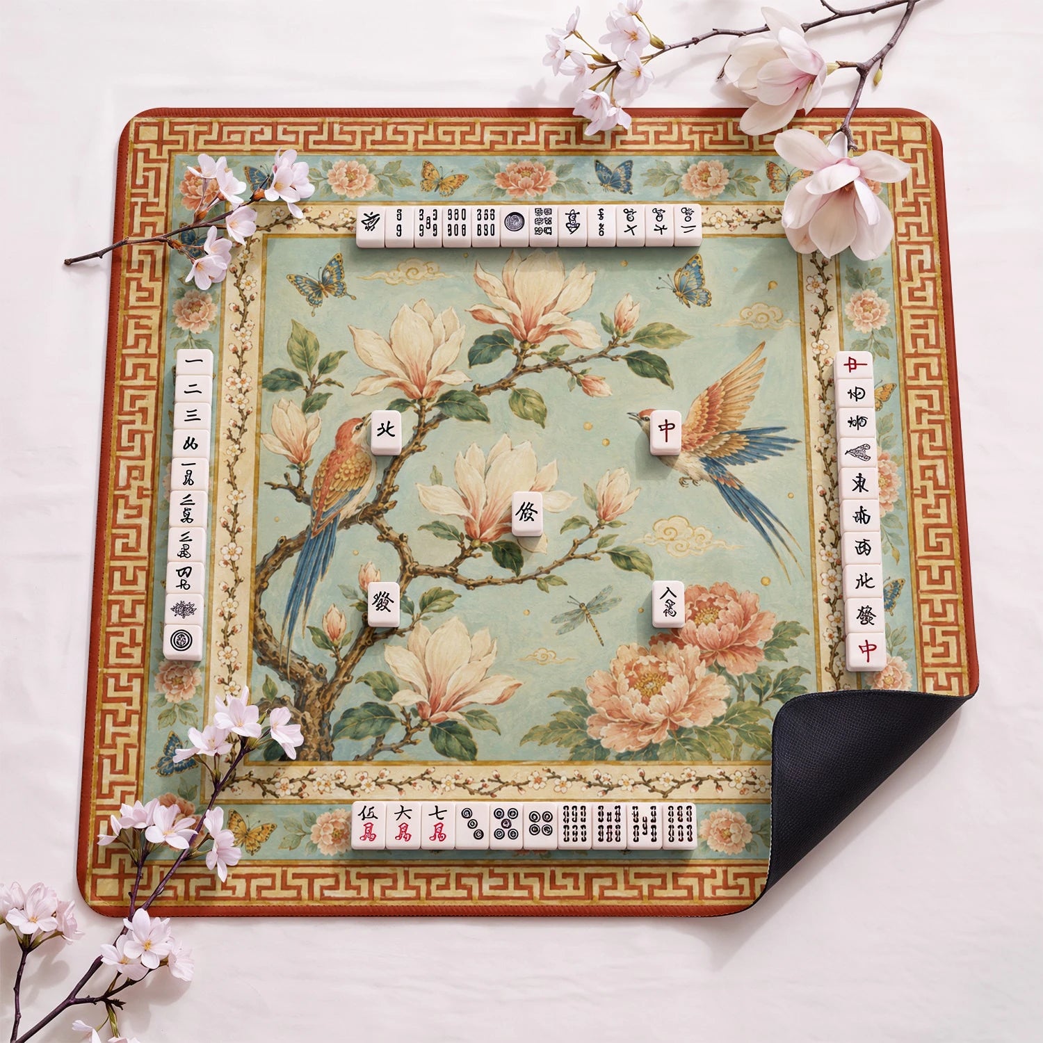 Chinoiserie Bird design close-up on mahjong mat surface