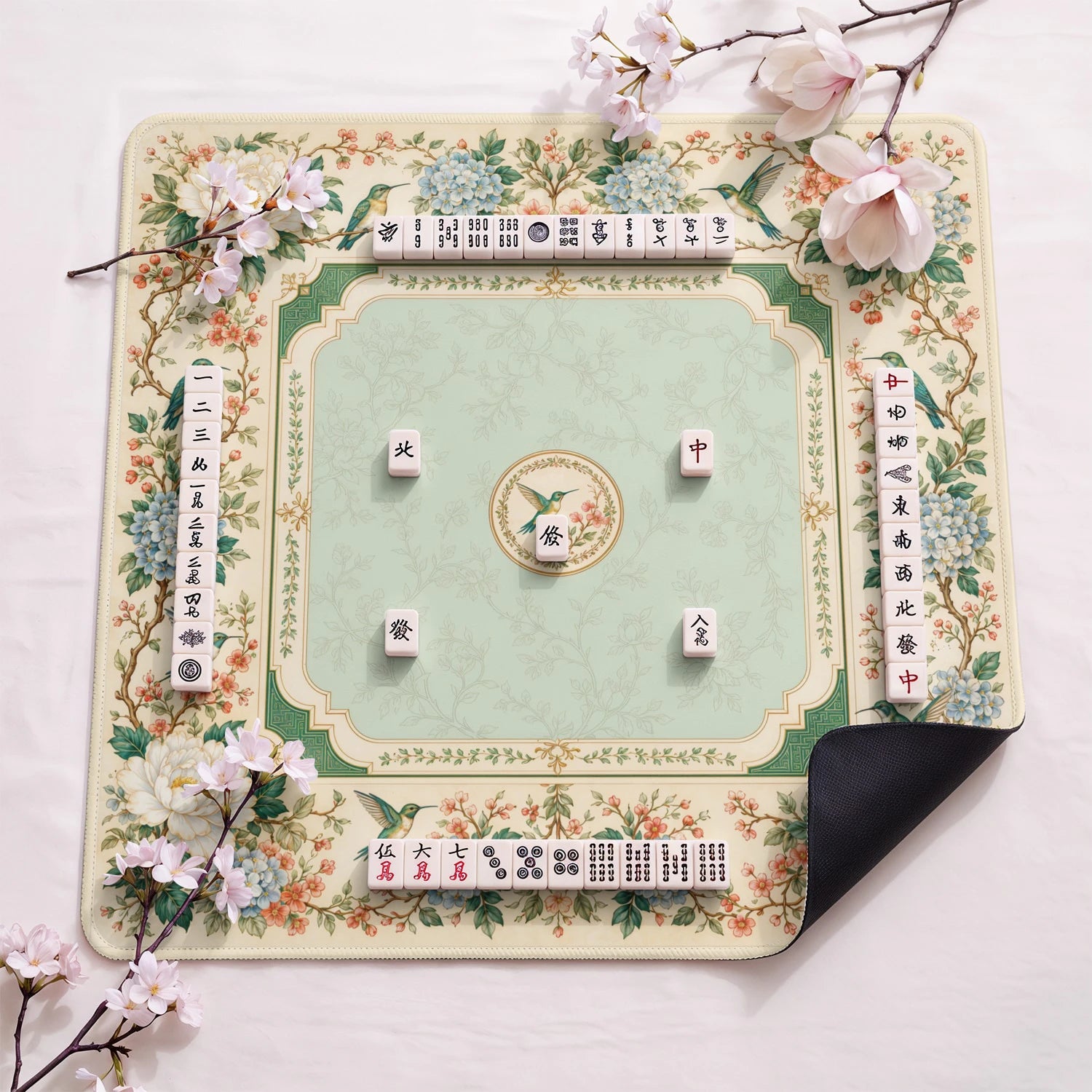 Cream Hummingbird design close-up on mahjong mat surface