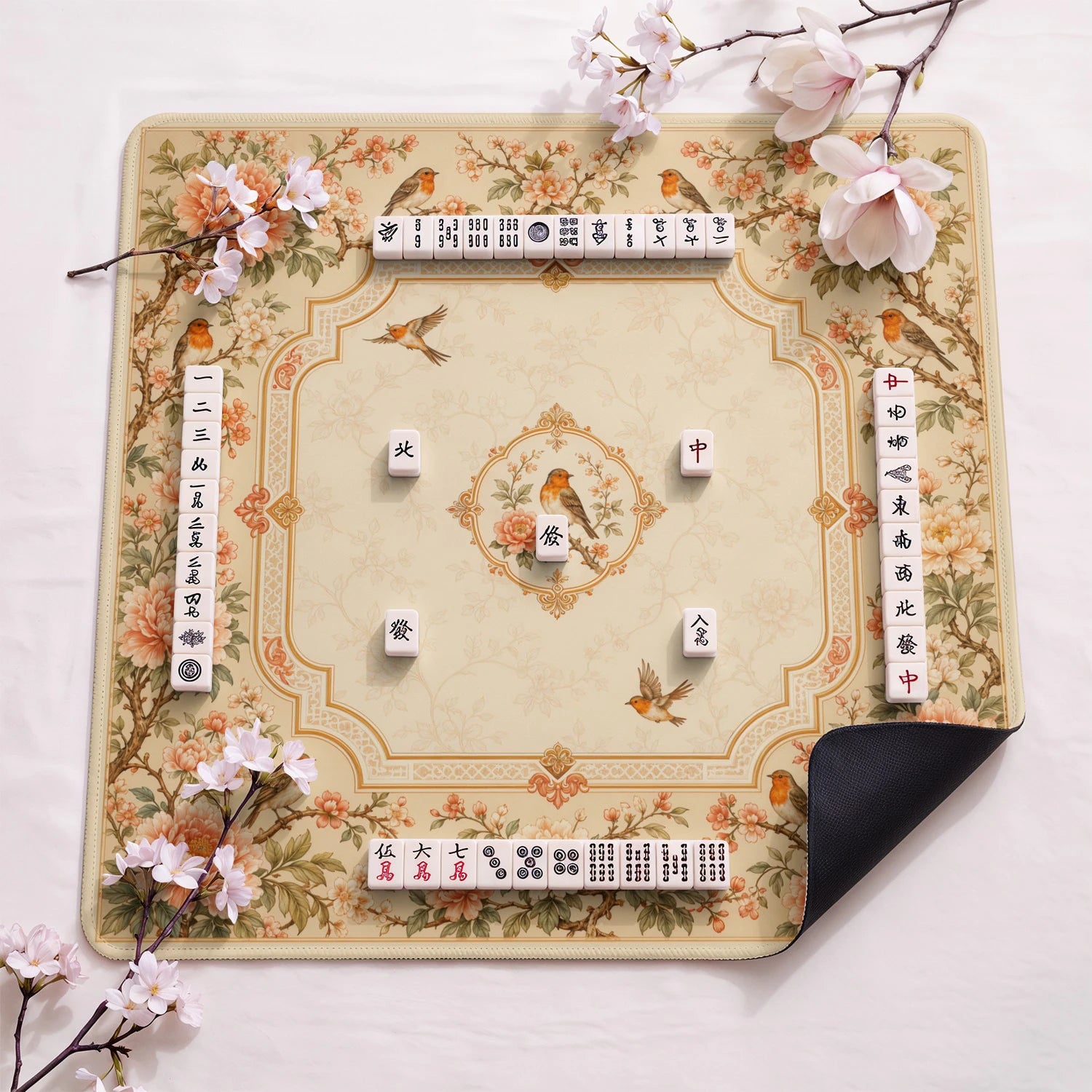 Cream Robin design close-up on mahjong mat surface