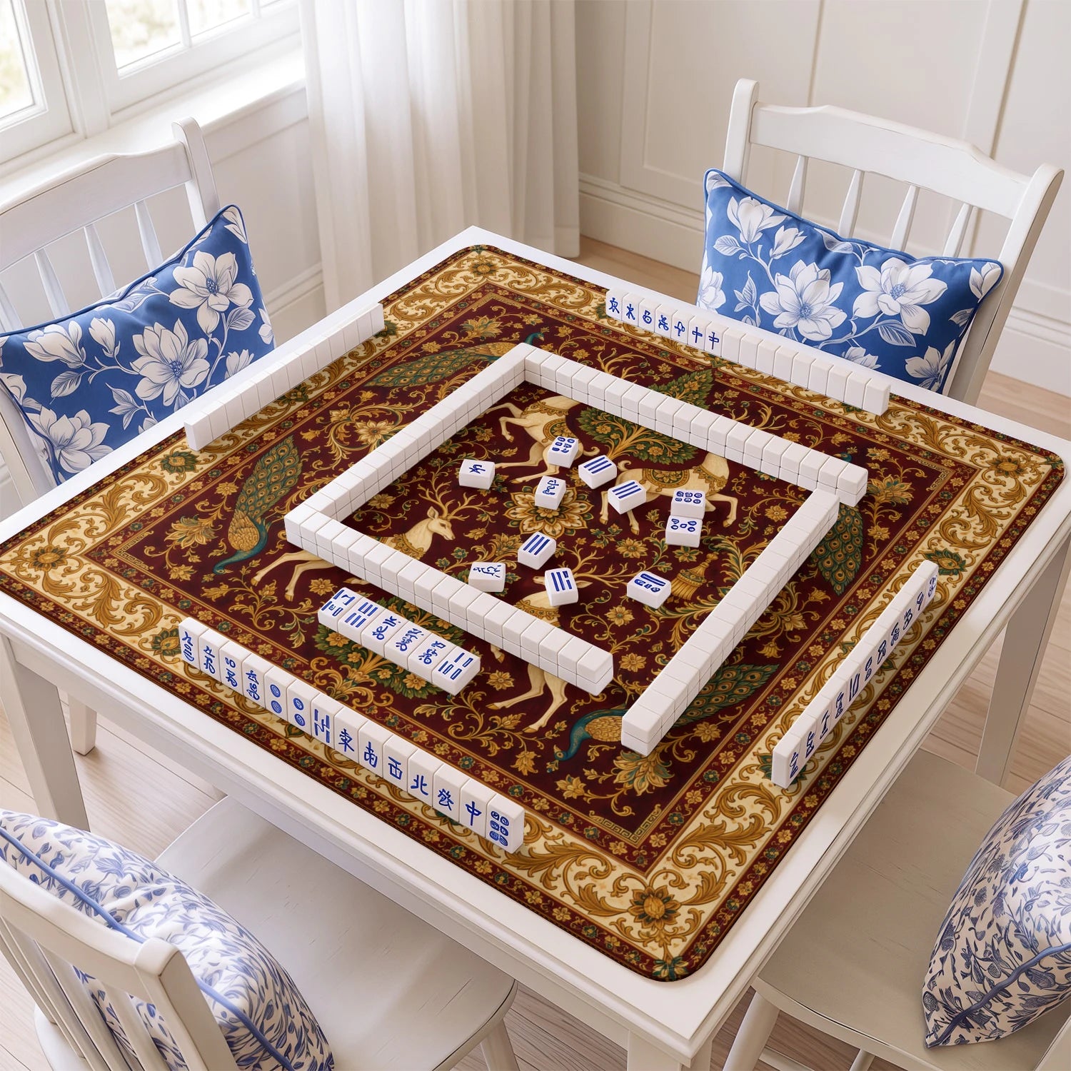 Crimson Stag mahjong mat with tiles and racks on the table