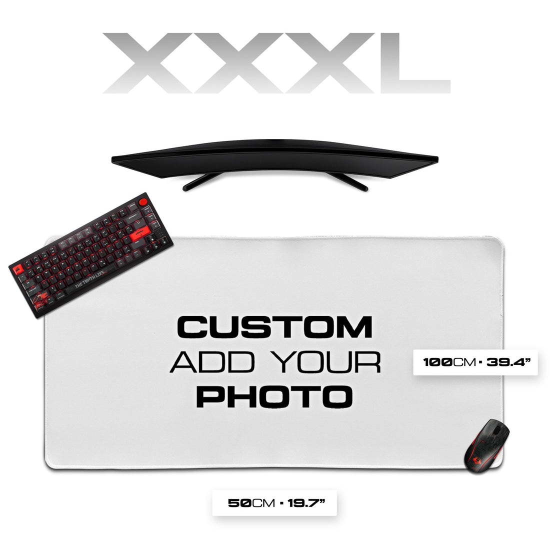Gaming desk setup with monitor, keyboard, mouse, and large mouse pad on a white background.