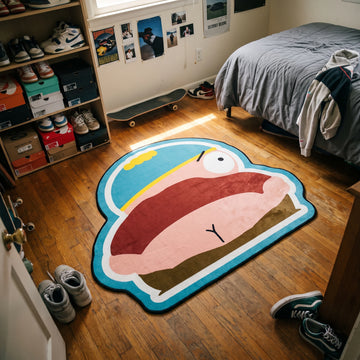 Eric Cartman shaped area rug laid out in a sunlit bedroom
