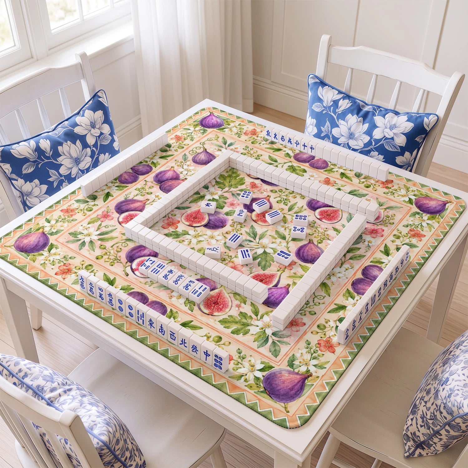 Fig Blossom mahjong mat with tiles and racks on the table