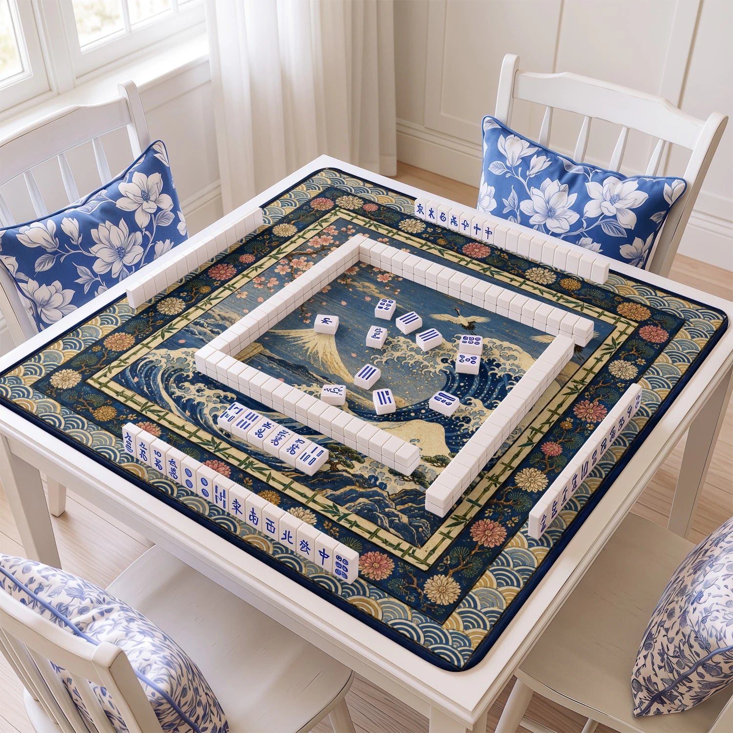 Great Wave mahjong mat with tiles and racks on the table