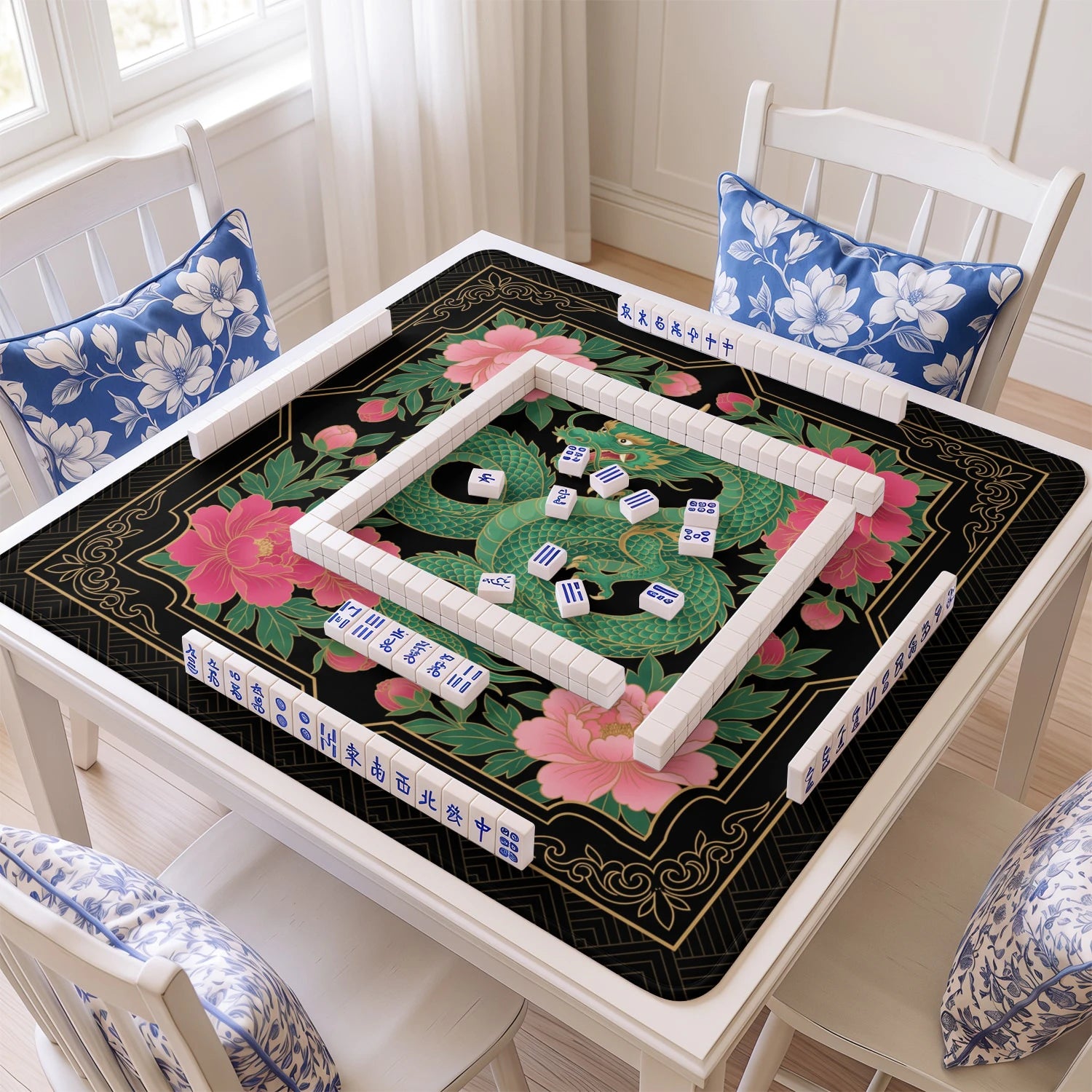 Green Dragon Peony mahjong mat with tiles and racks on the table
