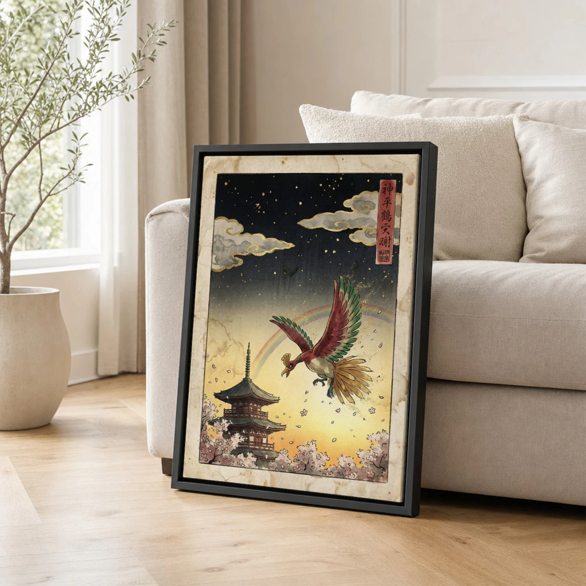 Ho-Oh Sakura Pokemon poster leaning beside a sofa - living room wall art