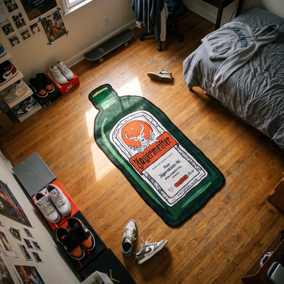 Overhead view of the Jagermeister shaped rug in a dorm room