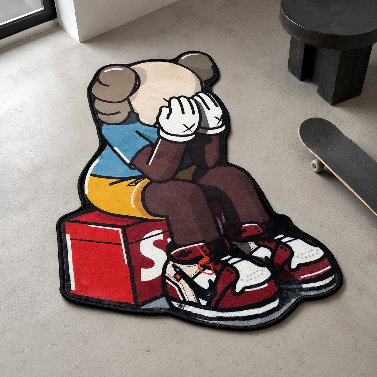 Kaws Sneaker shaped rug shown in a room setting