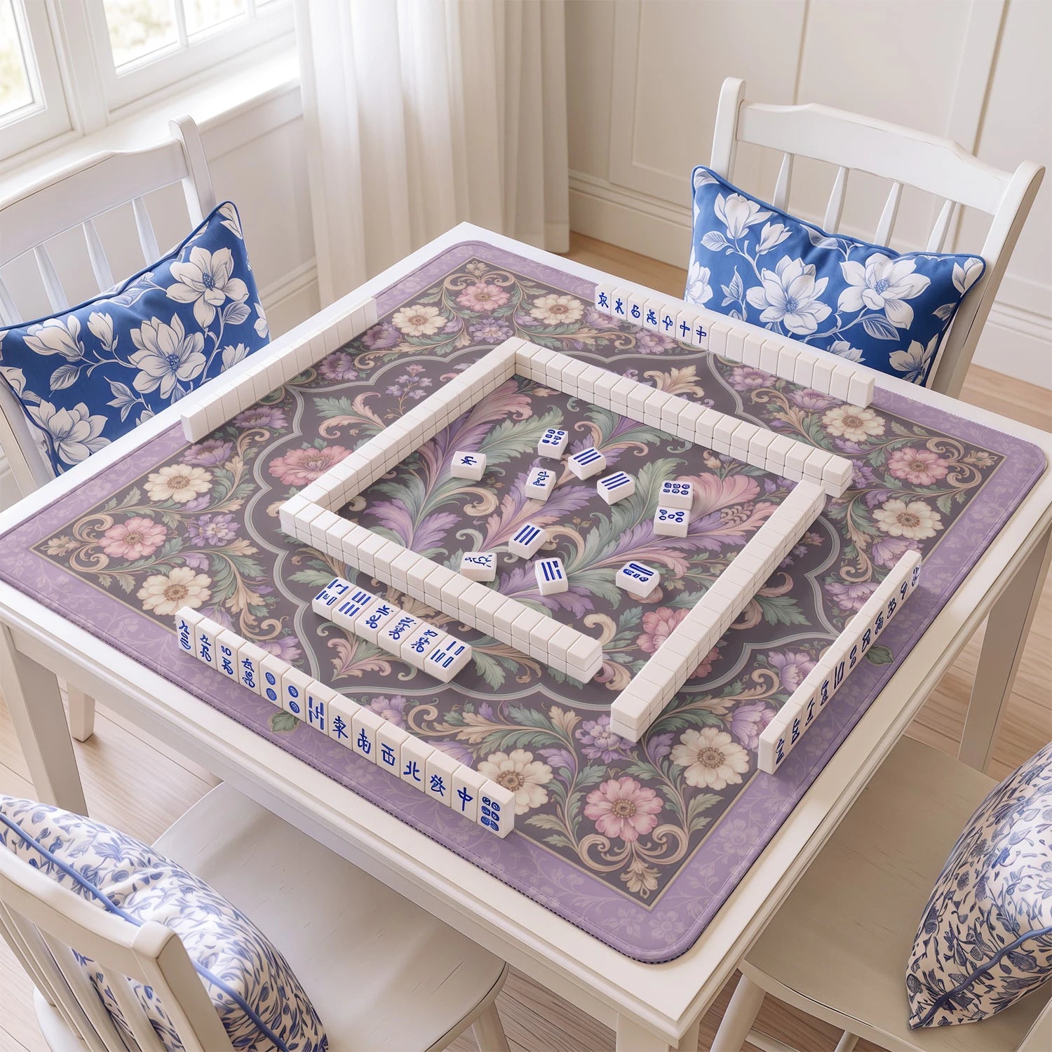 Lilac Damask mahjong mat with tiles and racks on the table