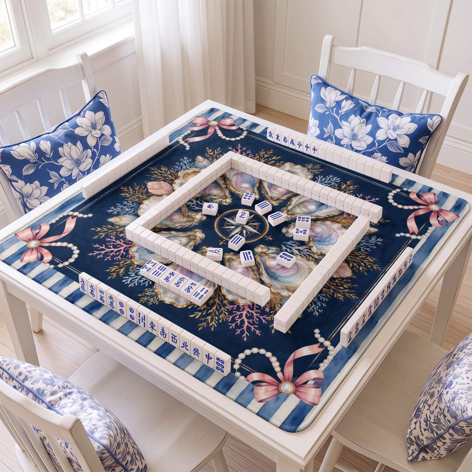 Navy Oyster mahjong mat with tiles and racks on the table