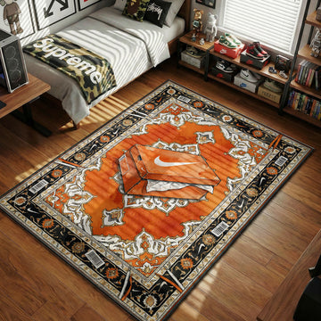 Nike orange shoebox baroque rug with black scroll border, cream medallion, and white swoosh detail