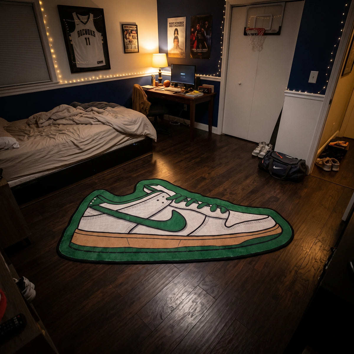 Top-down shot of the Nike SB Dunk shaped rug next to a desk setup