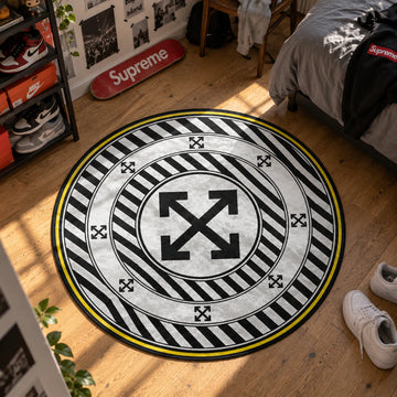 Off White Arrows hypebeast round rug on a bedroom floor - hypebeast chair mat