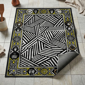 Black and white Op Art geometric kitchen mat with silver gold ornamental border and kitchen motifs