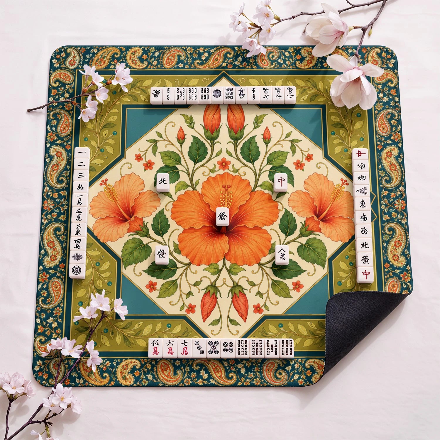 Orange Hibiscus design close-up on mahjong mat surface