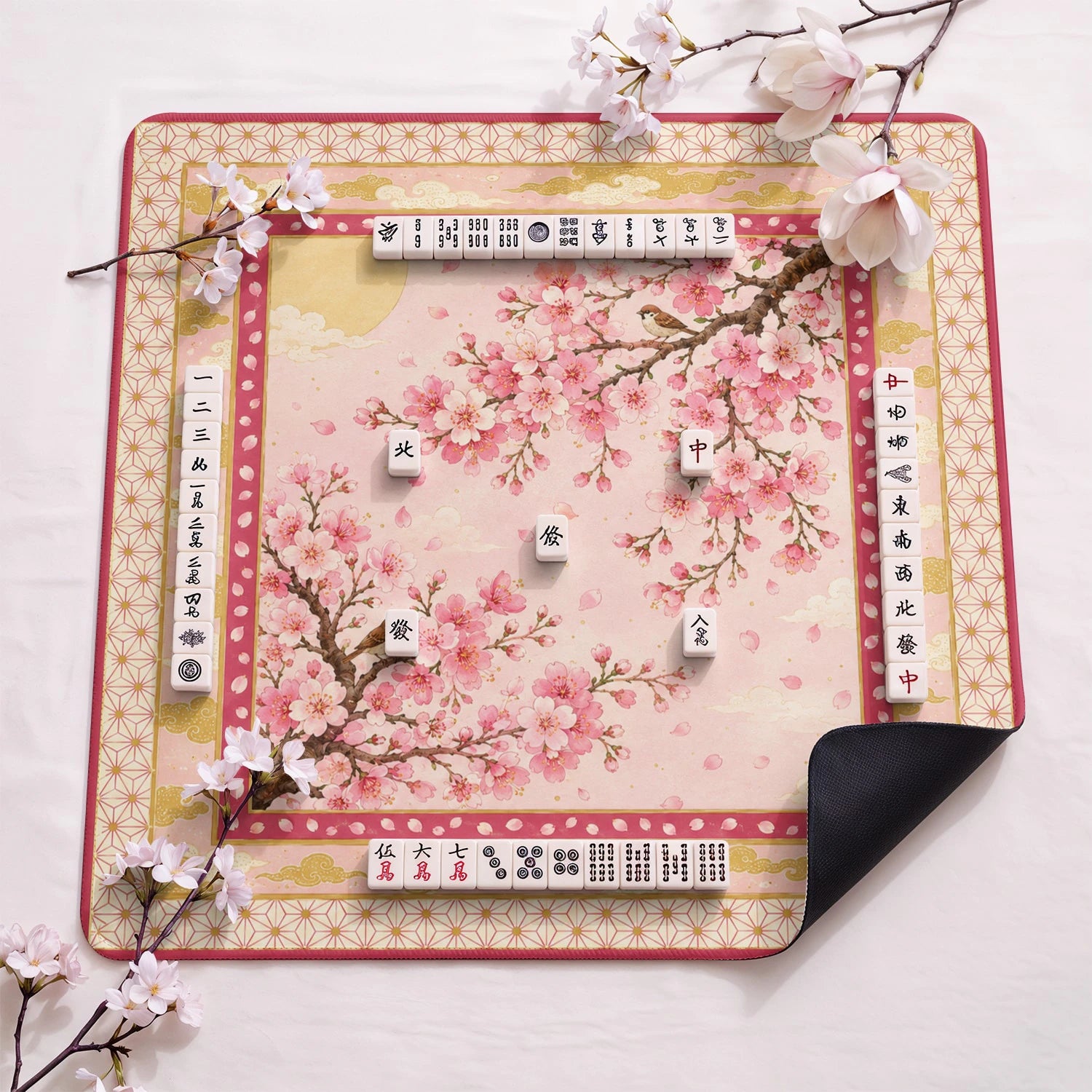 Pink Sakura design close-up on mahjong mat surface