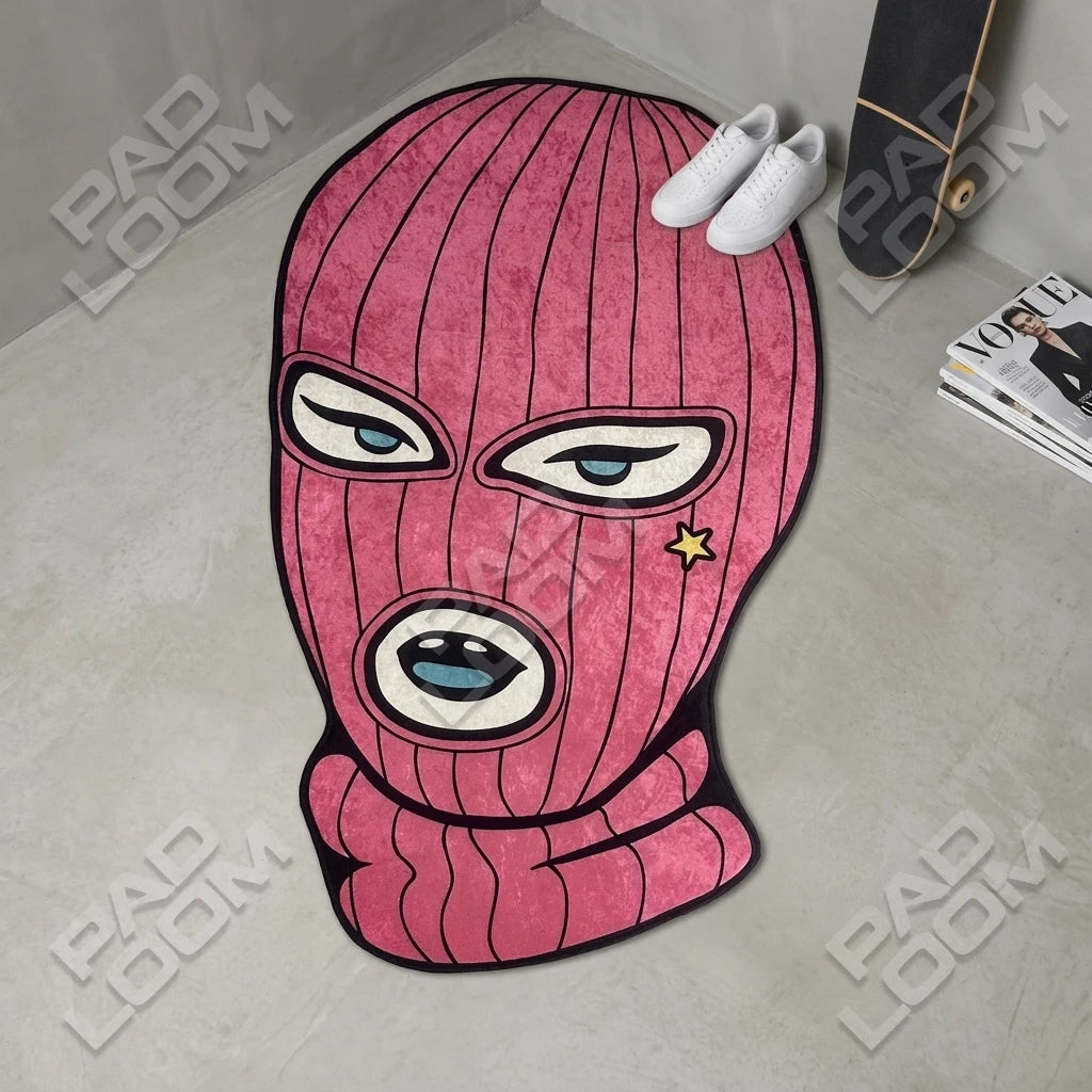 Pink Ski Mask shaped rug shown in a room setting