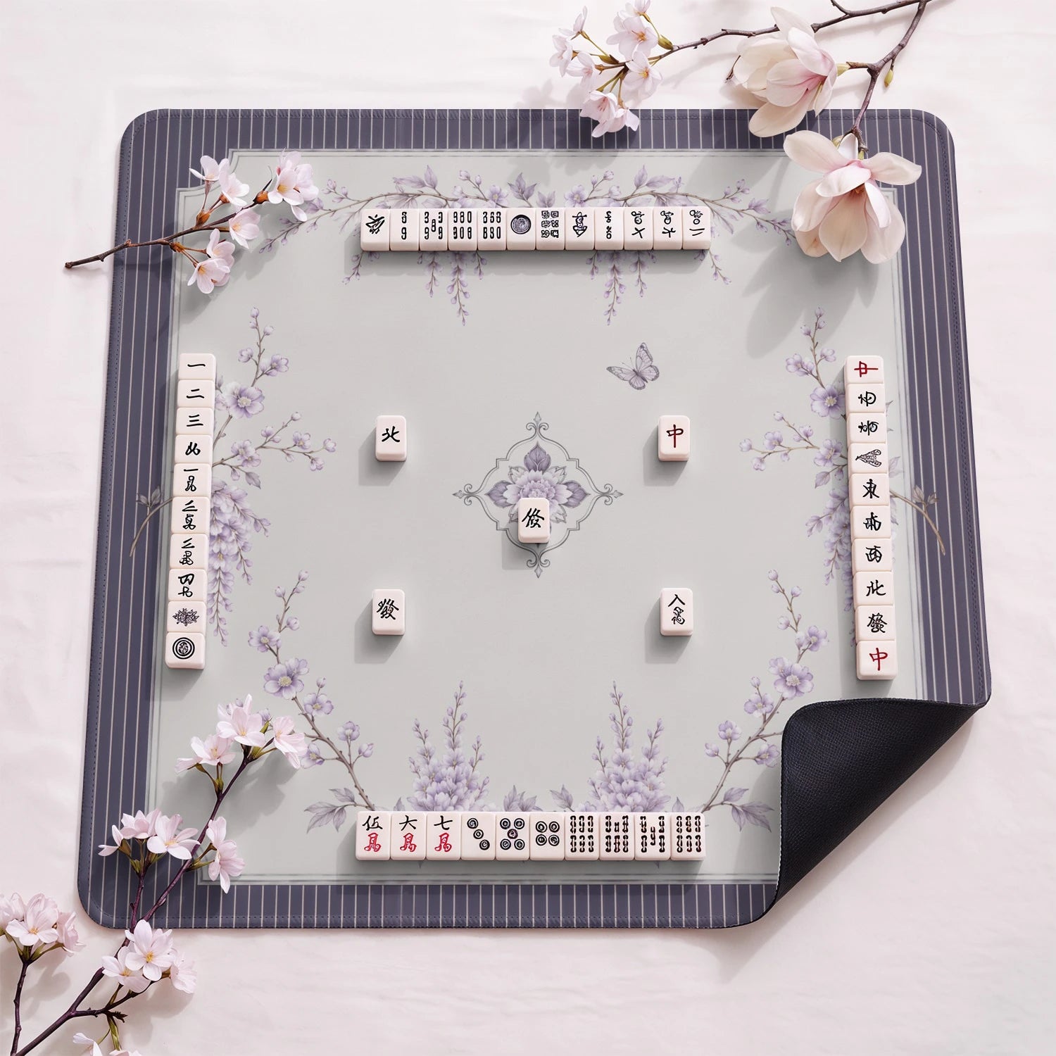 Plum Wisteria design close-up on mahjong mat surface