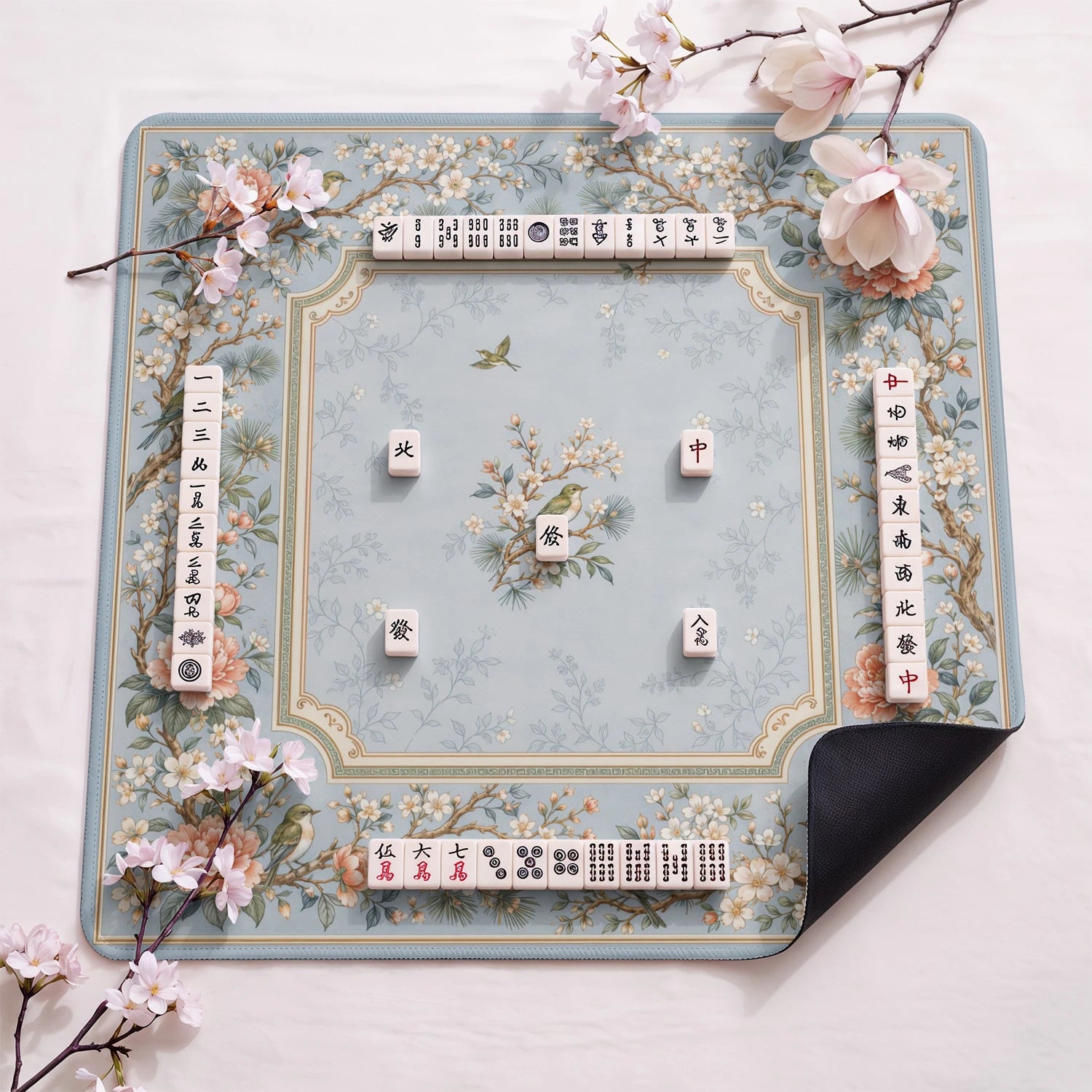 Powder Warbler design close-up on mahjong mat surface