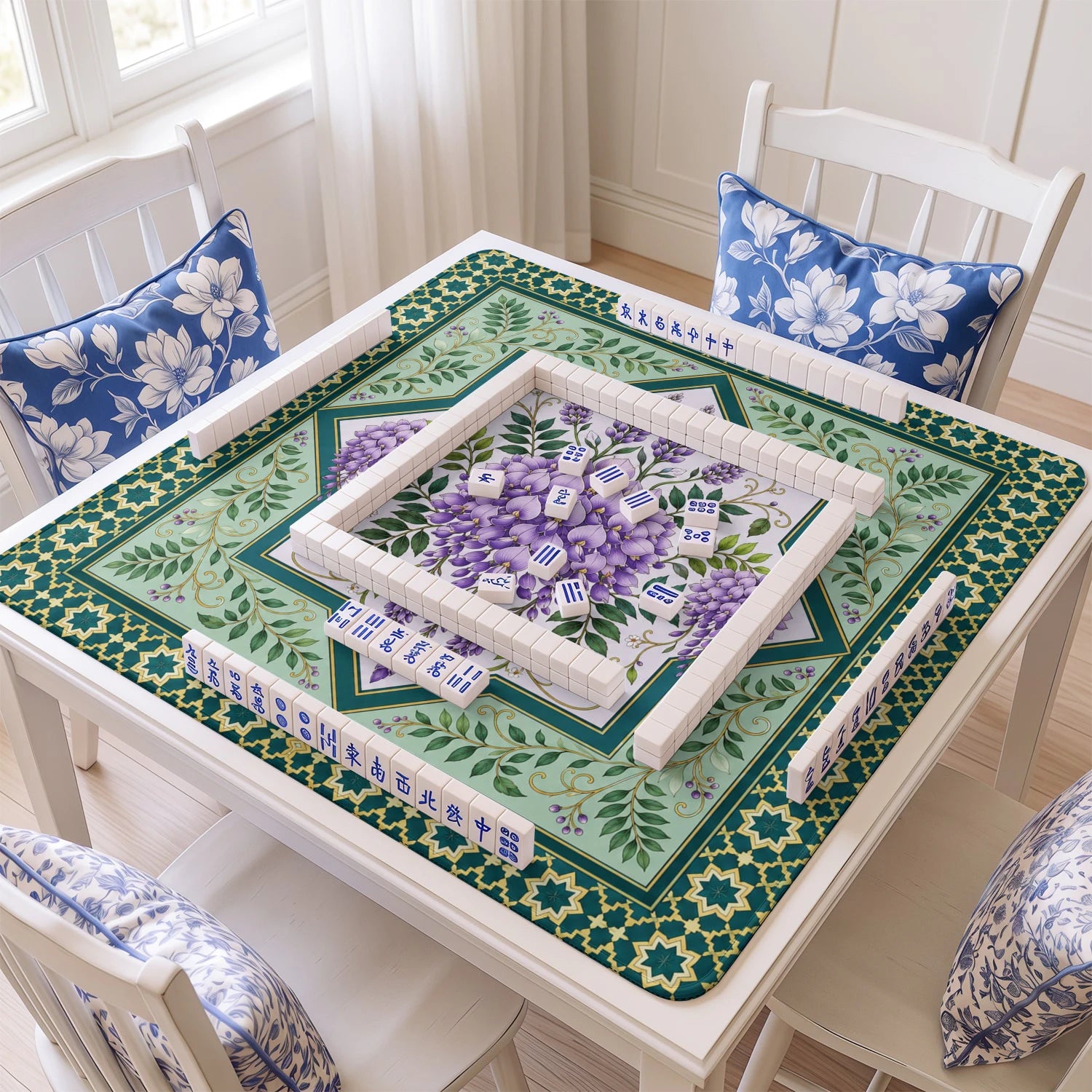 Purple Wisteria mahjong mat with tiles and racks on the table