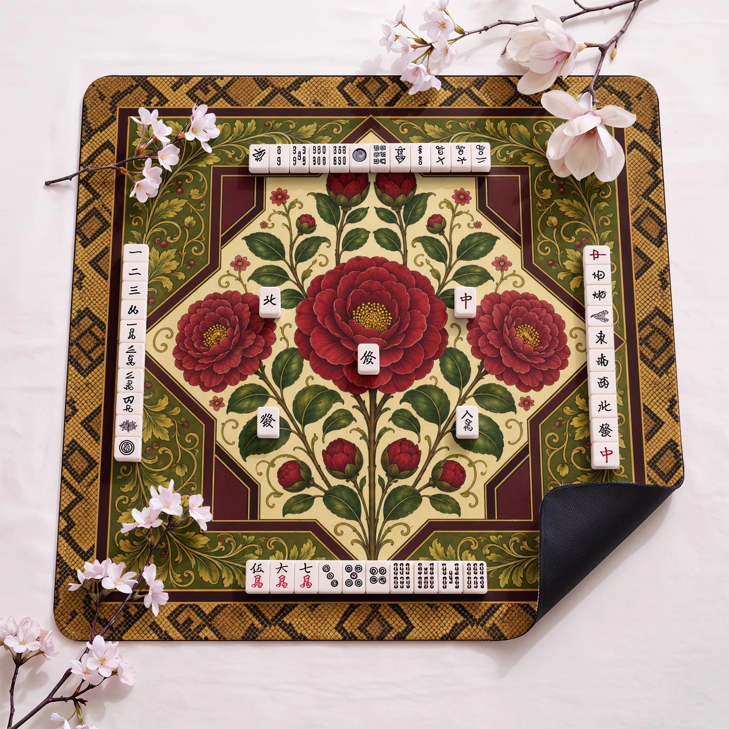 Red Camellia design close-up on mahjong mat surface