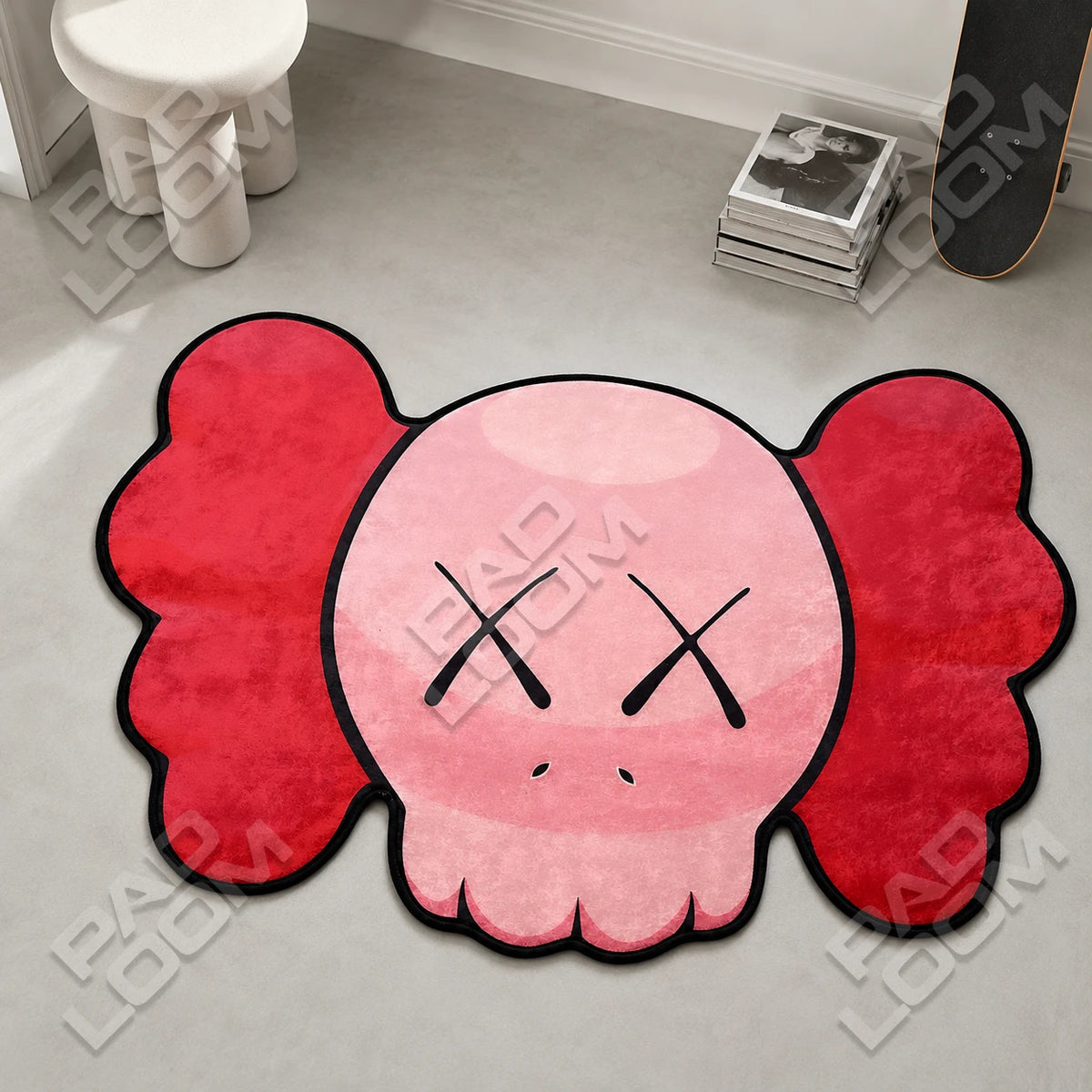 Red KAWS Skull shaped rug shown in a room setting