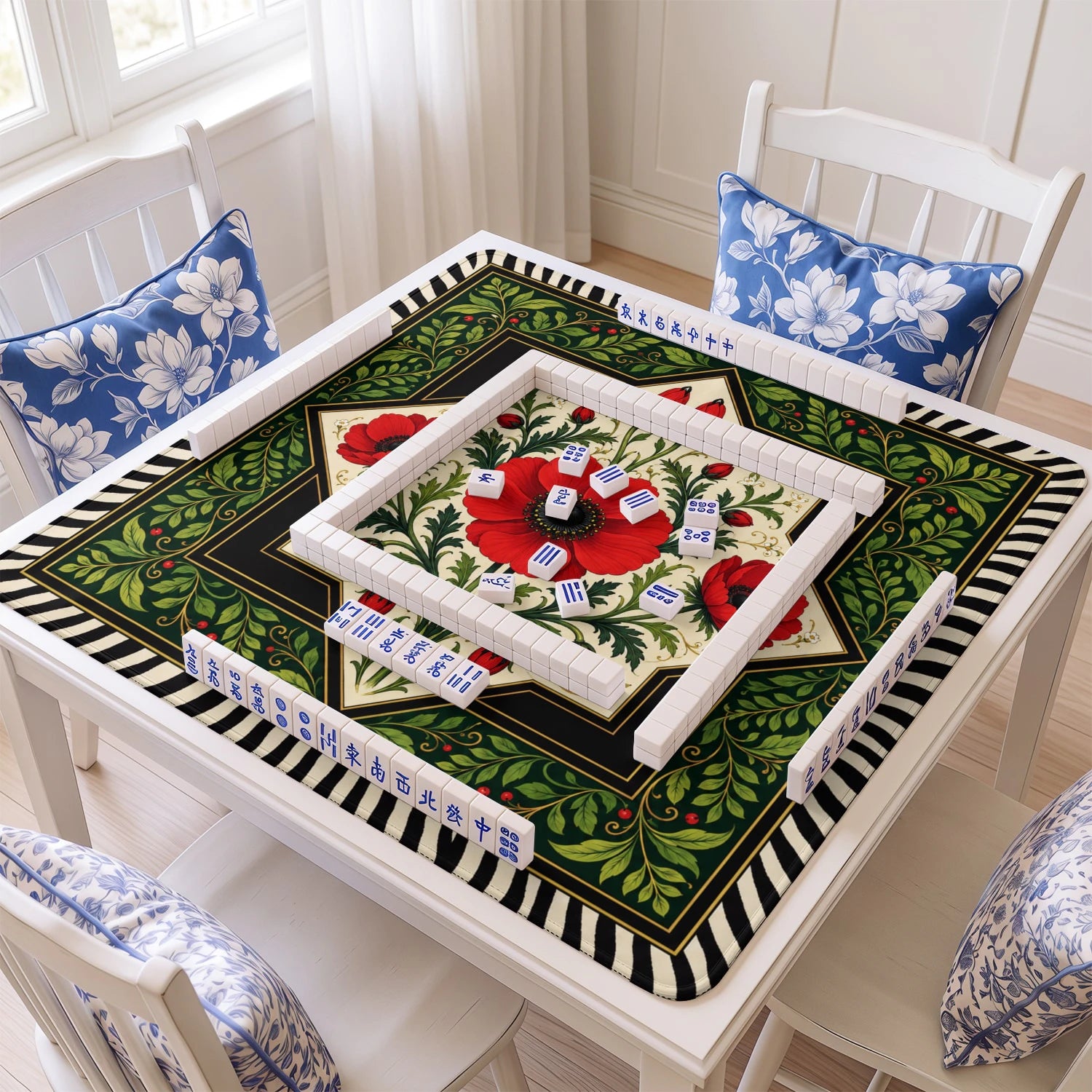 Red Poppy mahjong mat with tiles and racks on the table