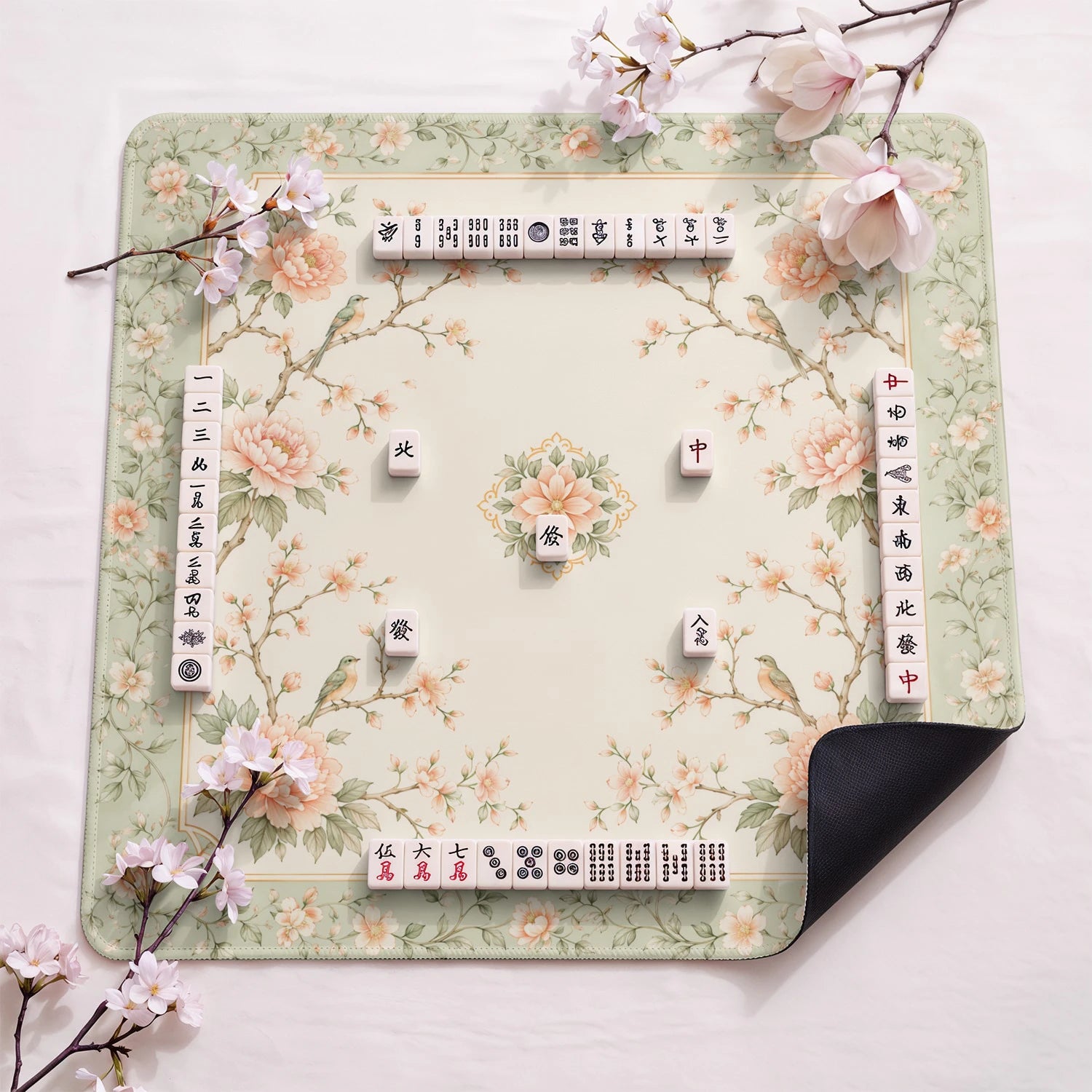 Rose Swallow design close-up on mahjong mat surface