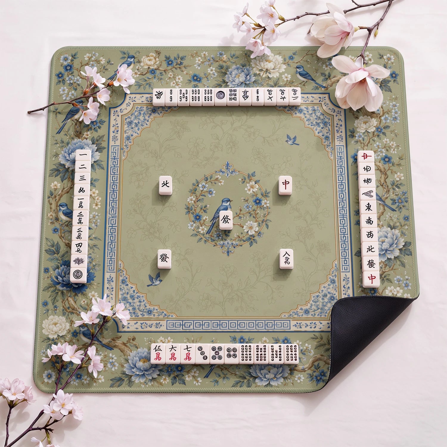 Sage Bluebird design close-up on mahjong mat surface