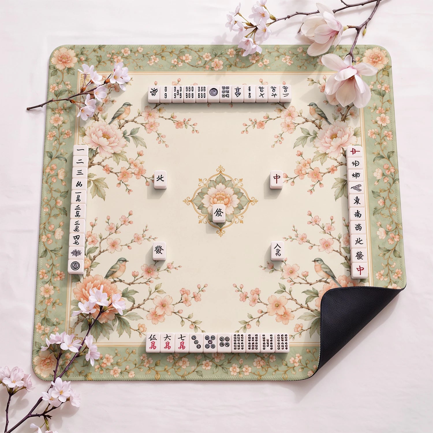 Sage Songbird design close-up on mahjong mat surface