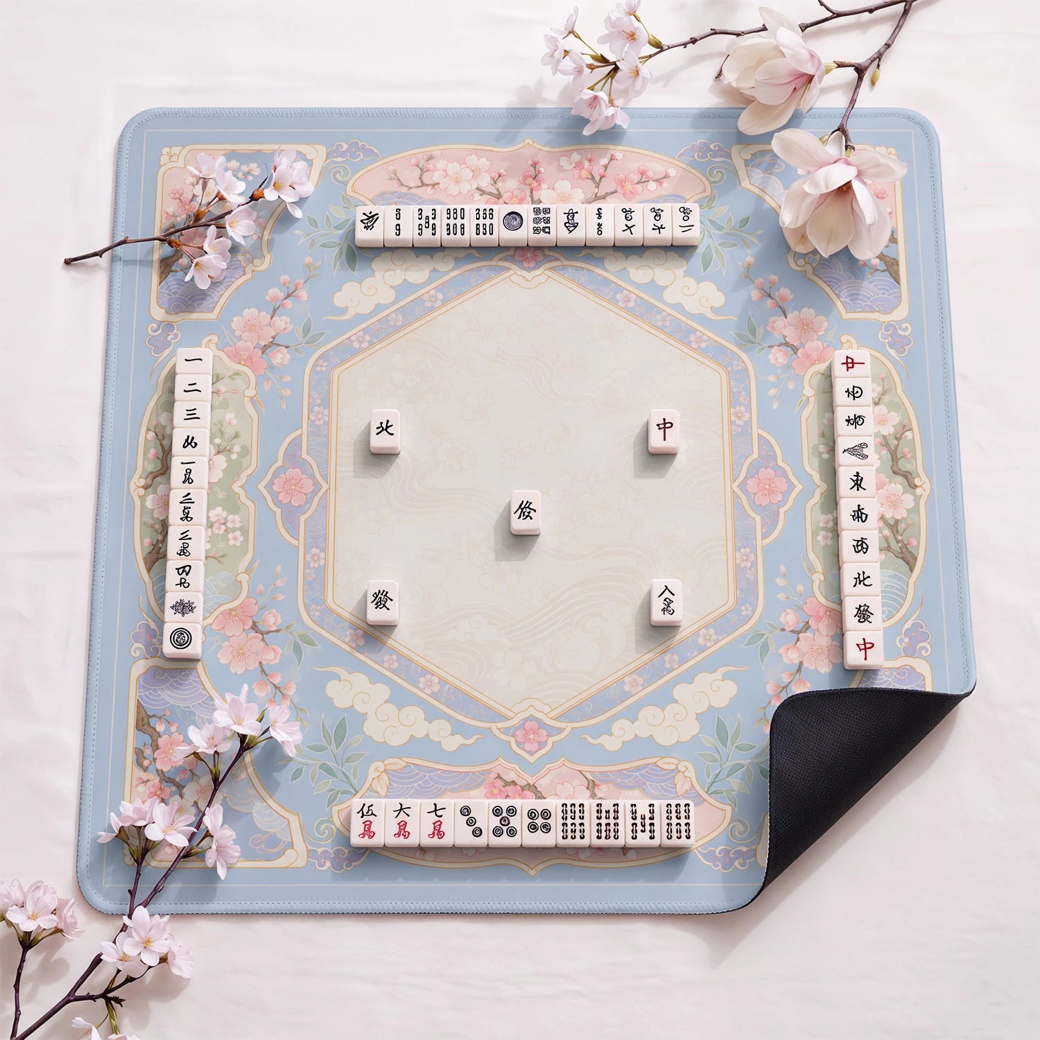 Sakura Cloud design close-up on mahjong mat surface