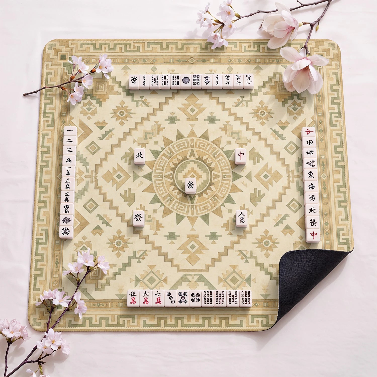 Sand Aztec Sun design close-up on mahjong mat surface
