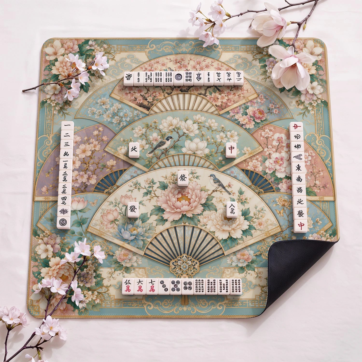 Silk Fan Garden design close-up on mahjong mat surface