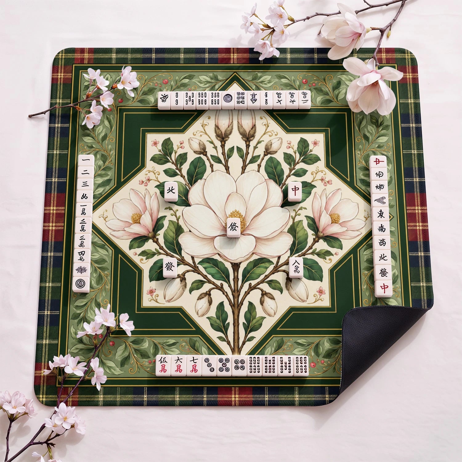 White Magnolia design close-up on mahjong mat surface