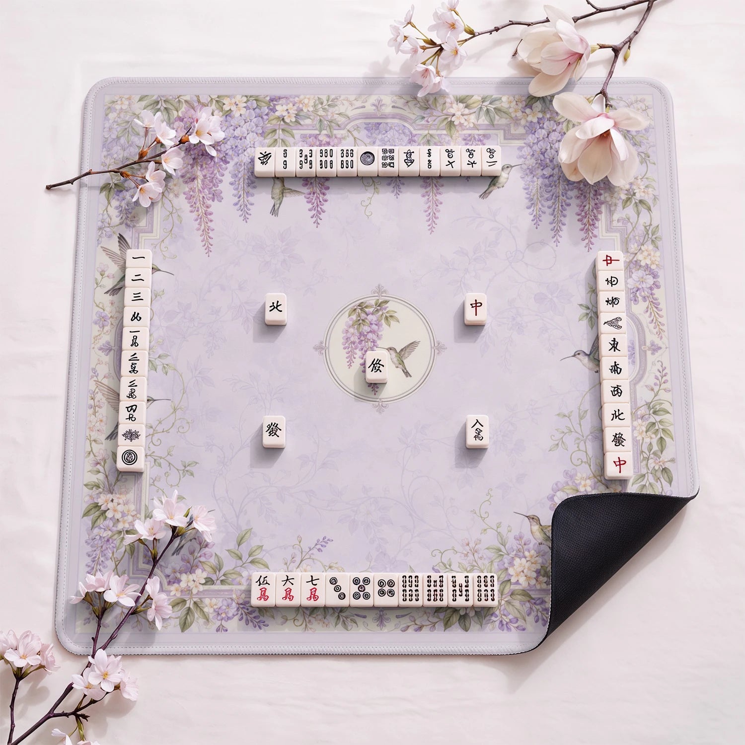 Wisteria Hummingbird design close-up on mahjong mat surface