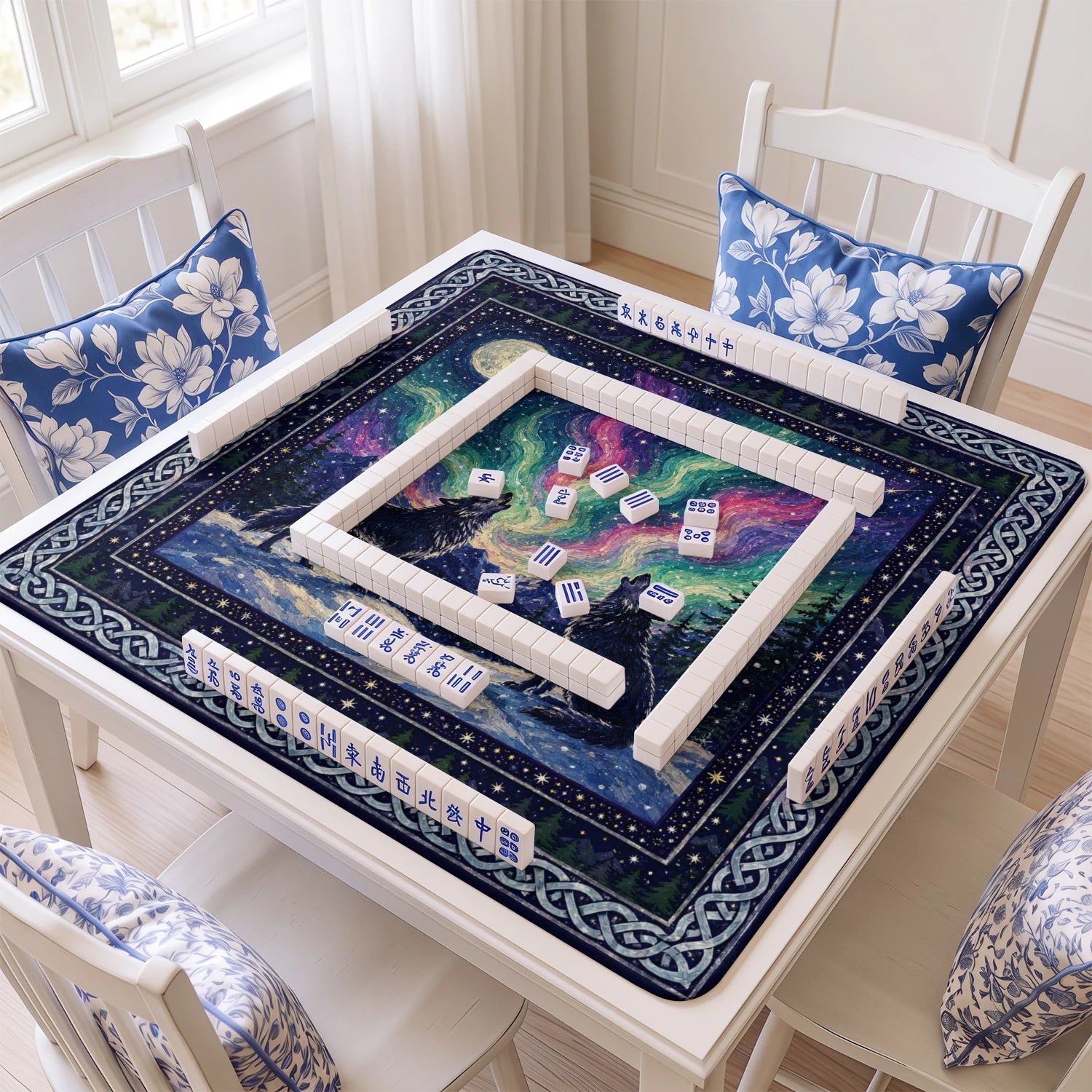 Wolf Moon mahjong mat with tiles and racks on the table