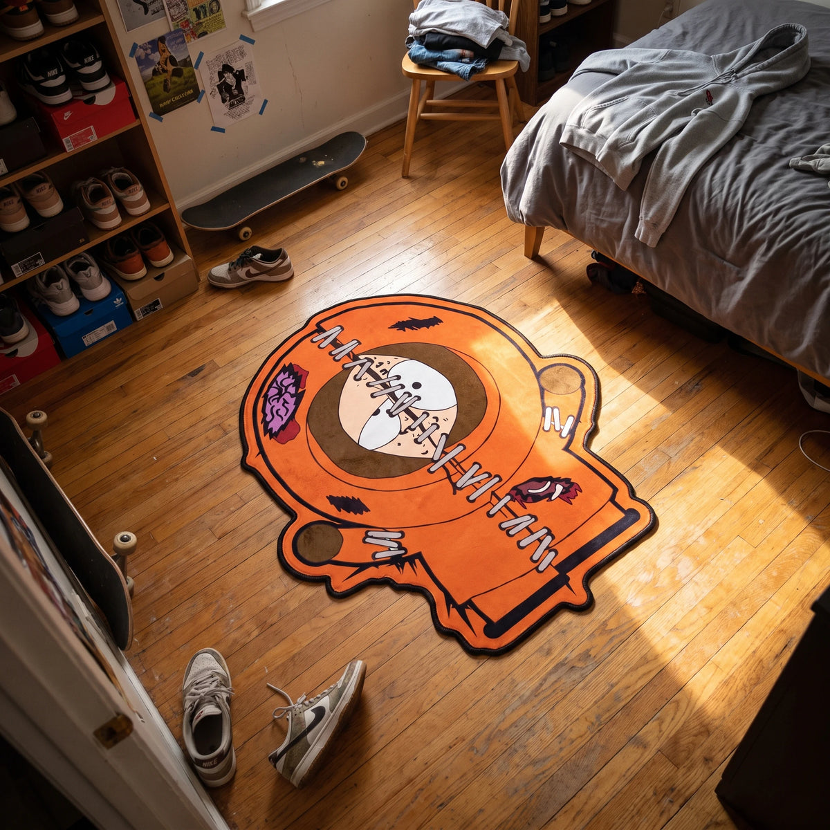 Overhead view of the Zombie Kenny shaped rug in a dorm room
